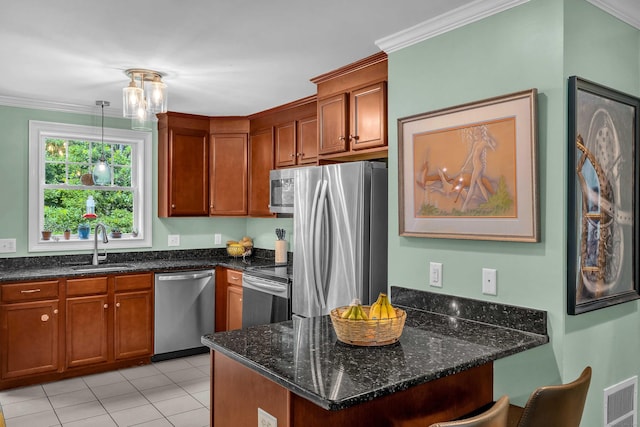41 Palmer St Unit 20, Norwich, CT 06360 - kitchen featuring appliances with stainless steel finishes, dark stone counters, a peninsula, brown cabinetry, and crown molding
