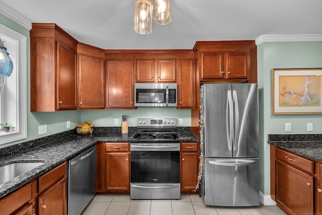 41 Palmer St Unit 20, Norwich, CT 06360 - kitchen with appliances with stainless steel finishes, light tile patterned floors, dark stone countertops, ornamental molding, and brown cabinets