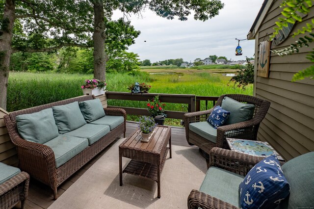 143 Sandy Point Rd Unit 143, Old Saybrook, CT 06475 - view of patio featuring an outdoor living space