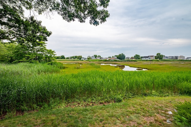 143 Sandy Point Rd Unit 143, Old Saybrook, CT 06475 - view of yard with a water view