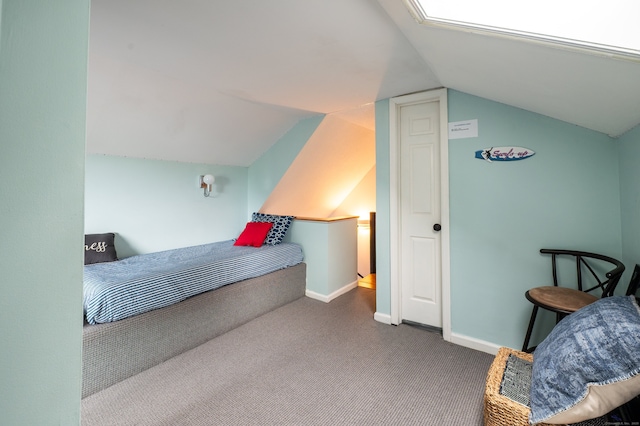 143 Sandy Point Rd Unit 143, Old Saybrook, CT 06475 - bedroom with carpet floors and vaulted ceiling