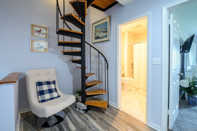143 Sandy Point Rd Unit 143, Old Saybrook, CT 06475 - stairs with wood finished floors and baseboards
