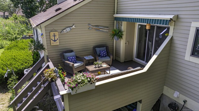 143 Sandy Point Rd Unit 143, Old Saybrook, CT 06475 - wooden terrace featuring an outdoor living space