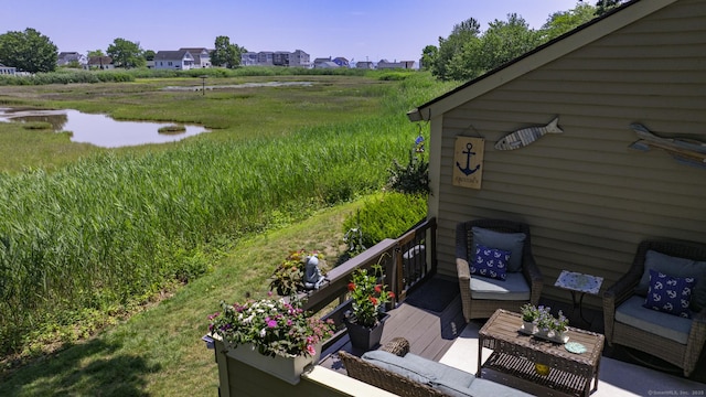 143 Sandy Point Rd Unit 143, Old Saybrook, CT 06475 - wooden deck featuring an outdoor living space, a water view, and a residential view