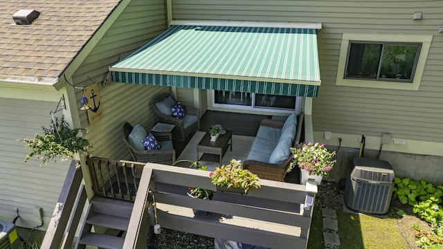 143 Sandy Point Rd Unit 143, Old Saybrook, CT 06475 - view of property exterior featuring outdoor lounge area and a metal roof