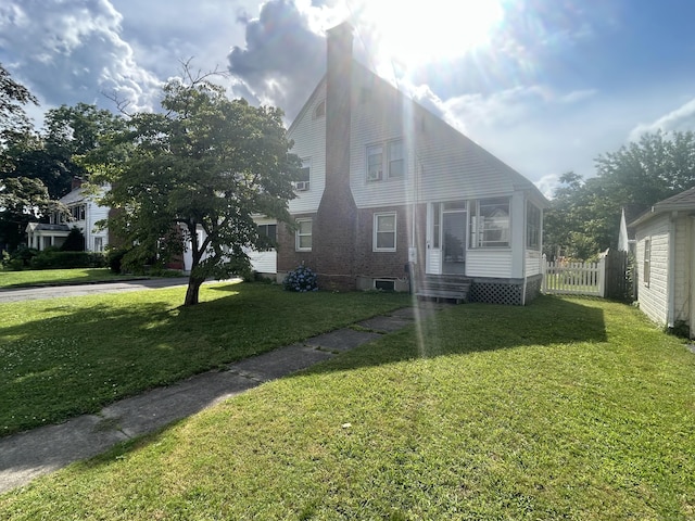 21 Walter Pl, East Hartford, CT 06108 - view of front of home with a sunroom