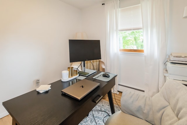 59 Flint Ridge Rd, Monroe, CT 06468 - office area featuring a baseboard heating unit and light wood-style flooring