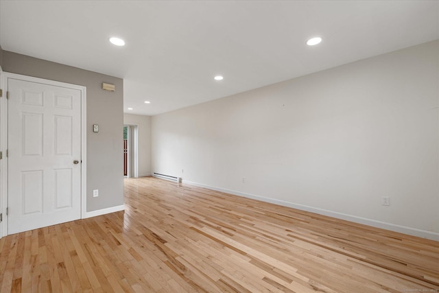 11 Fawn Rdg, Woodstock, CT 06281 - spare room featuring light wood-type flooring, a baseboard heating unit, and recessed lighting
