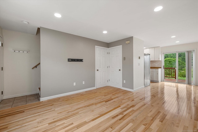 11 Fawn Rdg, Woodstock, CT 06281 - spare room featuring light wood-style floors, a smoke detector, and recessed lighting