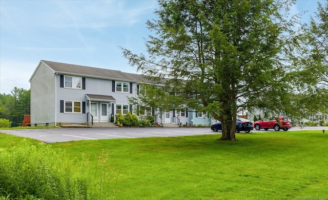 11 Fawn Rdg, Woodstock, CT 06281 - colonial-style house with uncovered parking and a front yard