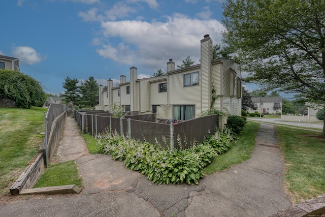 560 Yale Ave Unit 209, Meriden, CT 06450 - rear view of property featuring a chimney