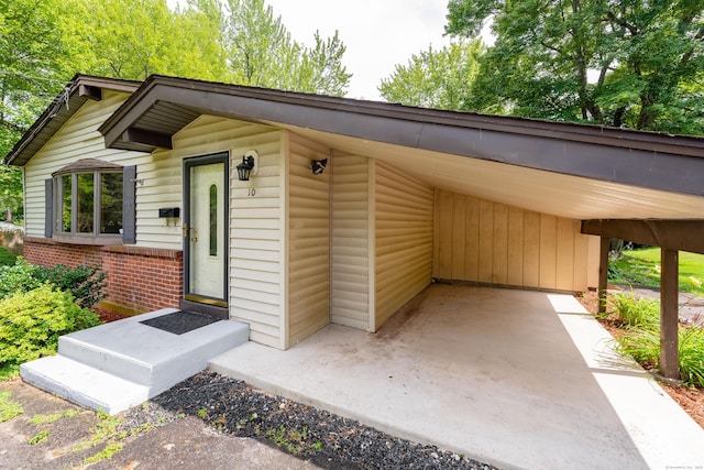 10 Thomas St, Windsor Locks, CT 06096 - view of front of home with a carport and brick siding