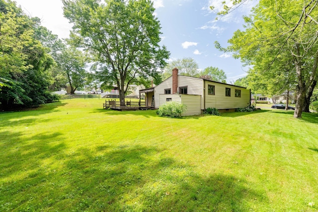 10 Thomas St, Windsor Locks, CT 06096 - view of grassy yard featuring a wooden deck