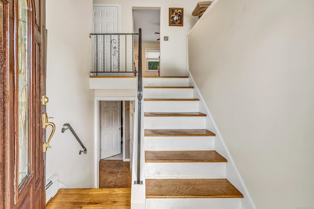 59 Laurel Wood Dr, Shelton, CT 06484 - stairway with a baseboard heating unit
