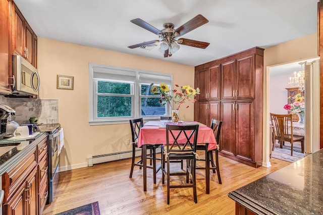 59 Laurel Wood Dr, Shelton, CT 06484 - dining room with a ceiling fan, baseboard heating, and light wood finished floors