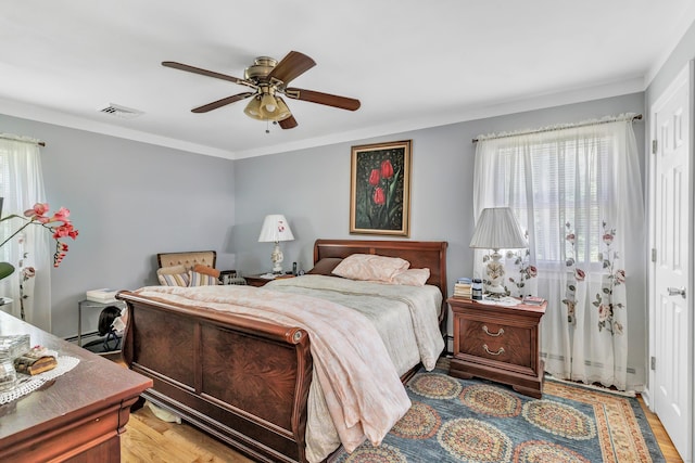 59 Laurel Wood Dr, Shelton, CT 06484 - bedroom with multiple windows, ceiling fan, and ornamental molding