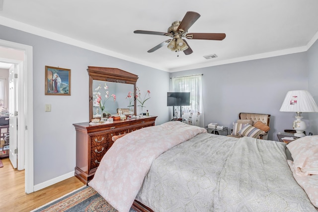 59 Laurel Wood Dr, Shelton, CT 06484 - bedroom featuring light wood finished floors, crown molding, and ceiling fan
