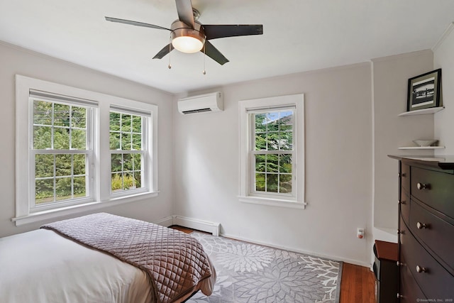 8 Gillies Ln, Norwalk, CT 06854 - bedroom featuring a wall unit AC, multiple windows, wood finished floors, and a baseboard heating unit