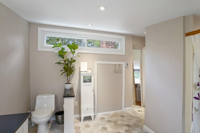 8 Gillies Ln, Norwalk, CT 06854 - bathroom featuring healthy amount of natural light and recessed lighting