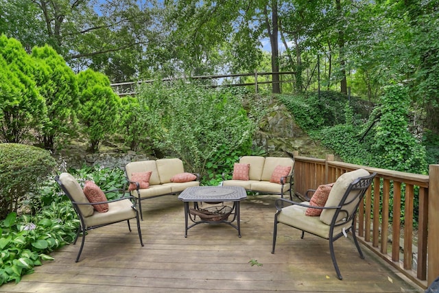 8 Gillies Ln, Norwalk, CT 06854 - wooden deck with an outdoor living space and view of wooded area