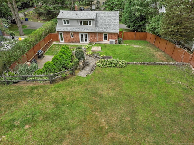 8 Gillies Ln, Norwalk, CT 06854 - back of property featuring brick siding, french doors, a fenced backyard, and a patio area