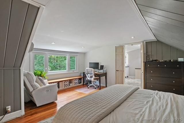 8 Gillies Ln, Norwalk, CT 06854 - bedroom featuring lofted ceiling, wood finished floors, and a desk