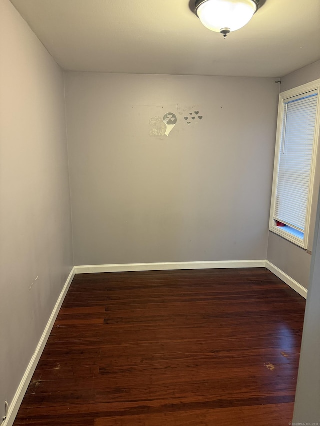 32 S St, Norwalk, CT 06854 - spare room with dark wood finished floors and baseboards