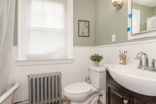 27 Thornton St, Hamden, CT 06517 - bathroom featuring radiator, vanity, tile walls, a tub, and curtained shower