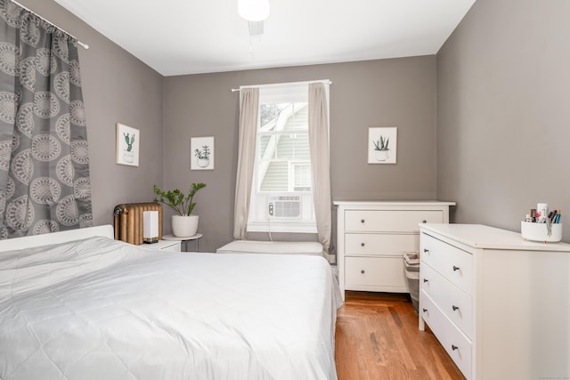 27 Thornton St, Hamden, CT 06517 - bedroom featuring light wood-style flooring and cooling unit