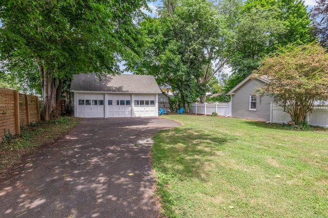27 Thornton St, Hamden, CT 06517 - view of yard featuring an outbuilding and a detached garage