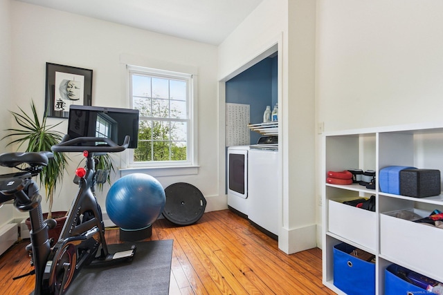 24 Warren Ave, Groton, CT 06355 - workout room with washer and dryer and hardwood / wood-style flooring