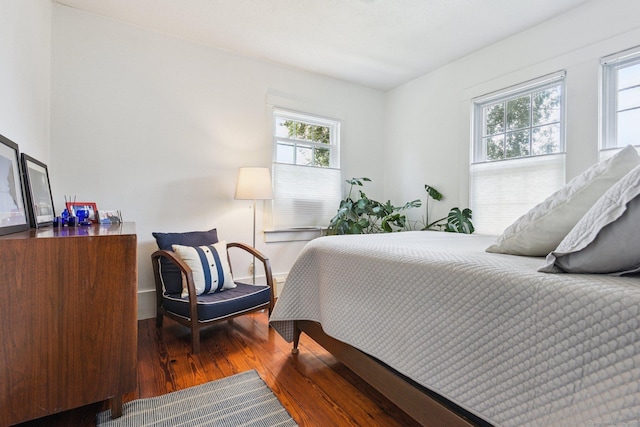 24 Warren Ave, Groton, CT 06355 - bedroom with wood finished floors and multiple windows