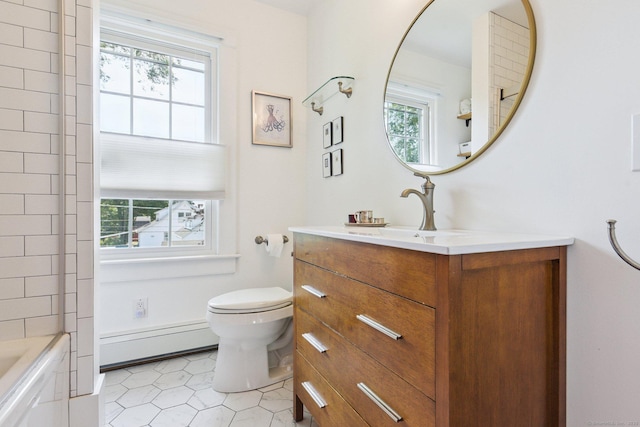 24 Warren Ave, Groton, CT 06355 - full bath with a baseboard heating unit, vanity, tile patterned floors, and bathing tub / shower combination