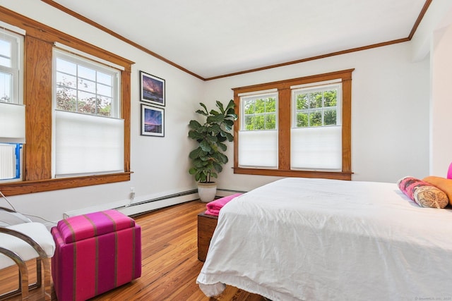 24 Warren Ave, Groton, CT 06355 - bedroom featuring ornamental molding, wood finished floors, and a baseboard radiator