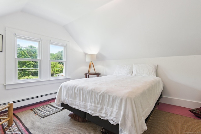 24 Warren Ave, Groton, CT 06355 - bedroom featuring baseboard heating, vaulted ceiling, and wood finished floors