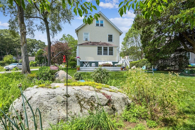 24 Warren Ave, Groton, CT 06355 - rear view of house featuring a yard