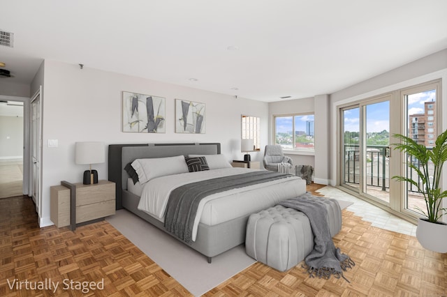 104 N St Apt 803, Stamford, CT 06902 - bedroom featuring access to outside and baseboards