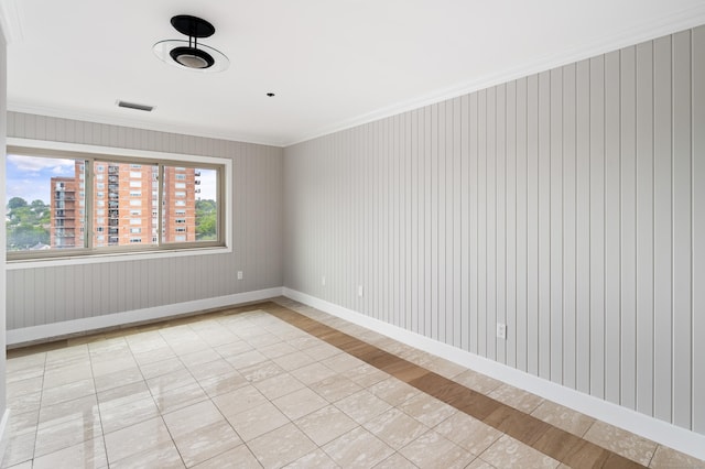 104 N St Apt 803, Stamford, CT 06902 - unfurnished room with light tile patterned flooring and ornamental molding