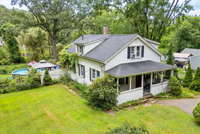 610 S Elm St, Wallingford, CT 06492 - view of front of house with a chimney, roof with shingles, a gazebo, and view of wooded area