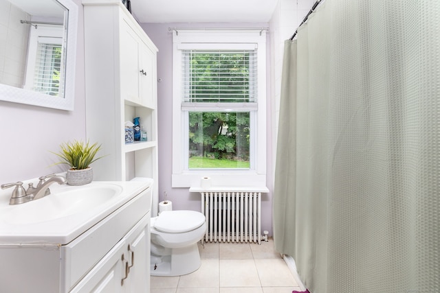 610 S Elm St, Wallingford, CT 06492 - bathroom featuring radiator heating unit, vanity, tile patterned flooring, and a shower with shower curtain