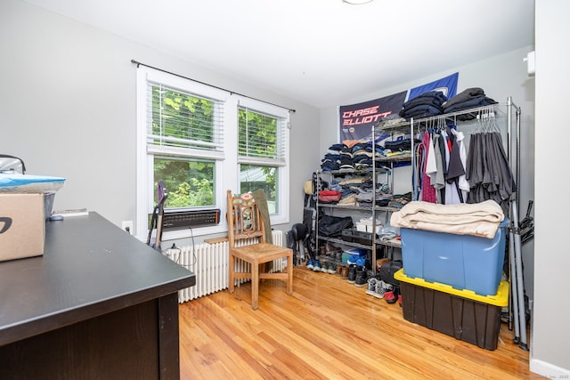 610 S Elm St, Wallingford, CT 06492 - walk in closet with wood finished floors and radiator heating unit
