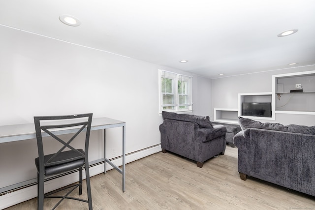 610 S Elm St, Wallingford, CT 06492 - living room featuring light wood finished floors, a baseboard radiator, and recessed lighting