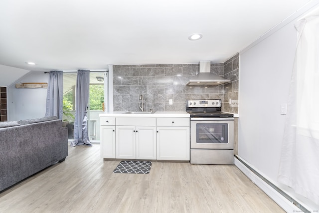 610 S Elm St, Wallingford, CT 06492 - kitchen featuring stainless steel electric stove, wall chimney range hood, a baseboard radiator, tasteful backsplash, and light countertops