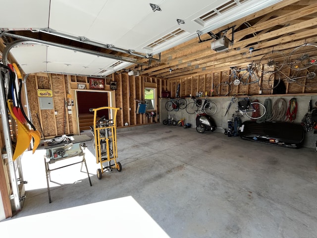 23 Little Bunggee Hill Rd, Woodstock, CT 06282 - garage featuring a garage door opener