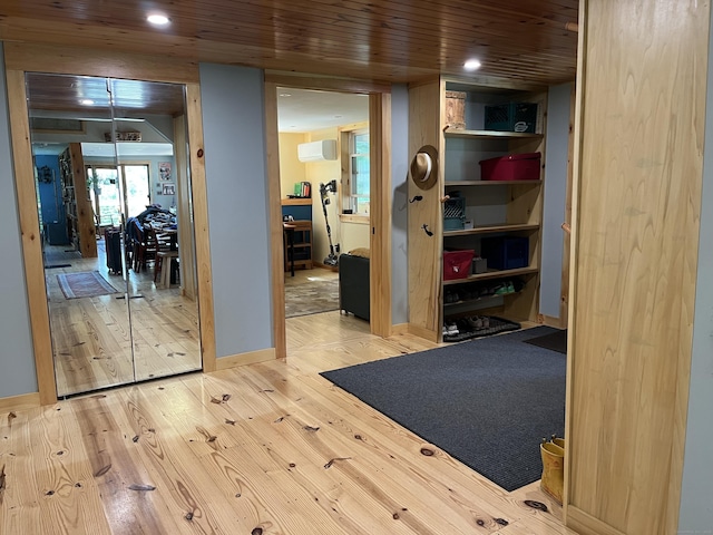 23 Little Bunggee Hill Rd, Woodstock, CT 06282 - hallway featuring wood finished floors, a wall mounted air conditioner, recessed lighting, and wood ceiling