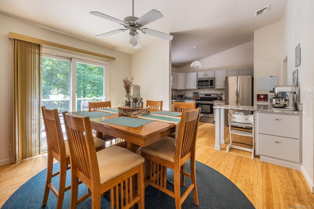 111 Nicole Dr, Milford, CT 06460 - dining space with light wood-type flooring, ceiling fan, and lofted ceiling