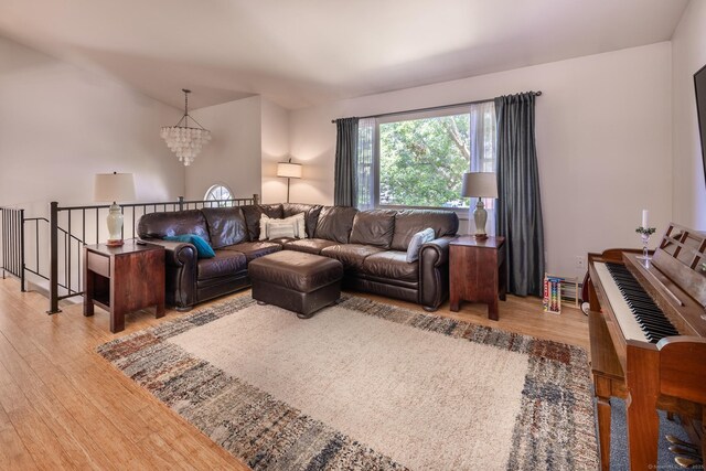 111 Nicole Dr, Milford, CT 06460 - living room featuring wood finished floors and a chandelier