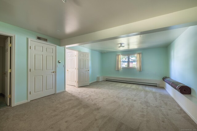 111 Nicole Dr, Milford, CT 06460 - unfurnished bedroom featuring a baseboard radiator and carpet floors