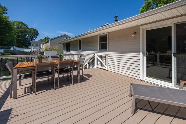 111 Nicole Dr, Milford, CT 06460 - wooden deck with outdoor dining area