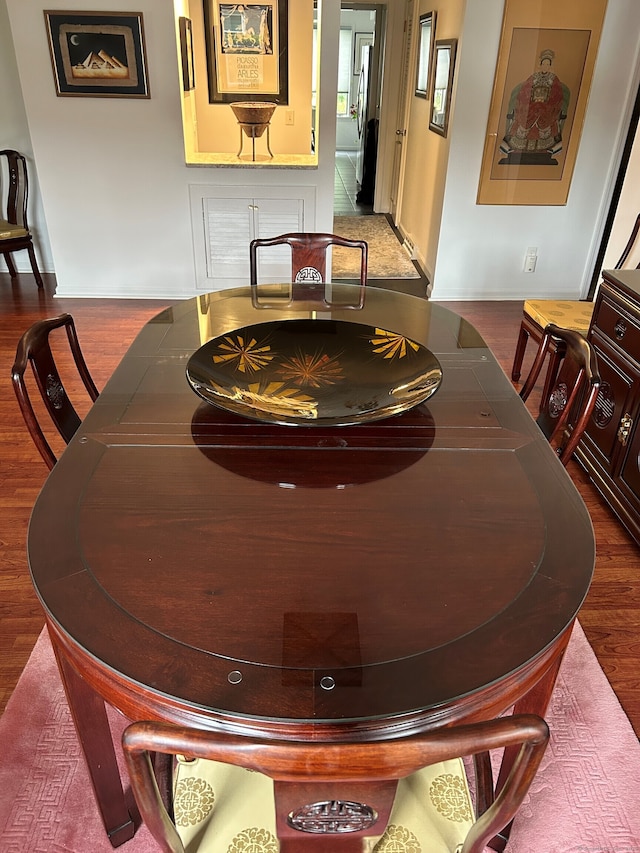 210 Jamestown Rd Unit 210, Stratford, CT 06614 - dining area with wood finished floors and baseboards